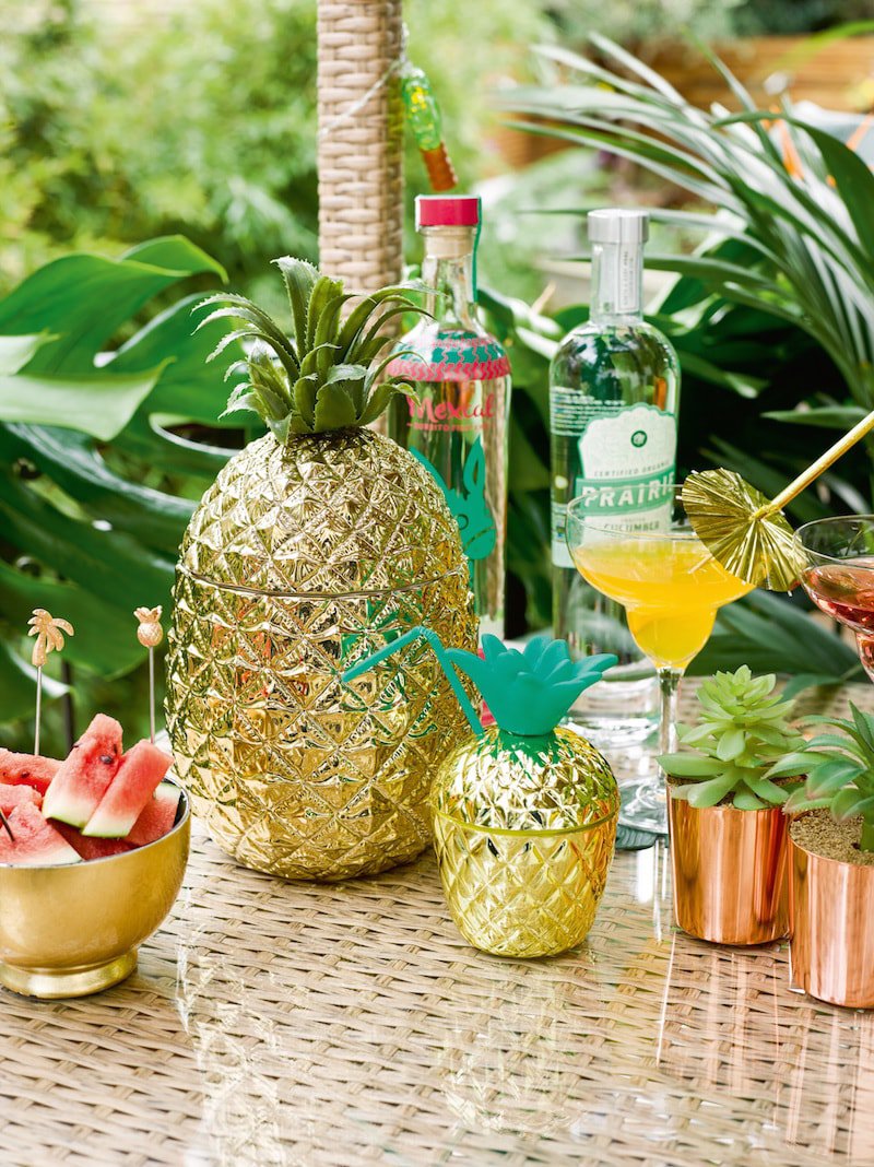 Talking-Tables-Tropical-Fiesta-Outdoor-entertaining-bar-drinks-station-Pineapple-ice-bucket-and-gold-cup-lifestyle-Portrait copy-min.jpg
