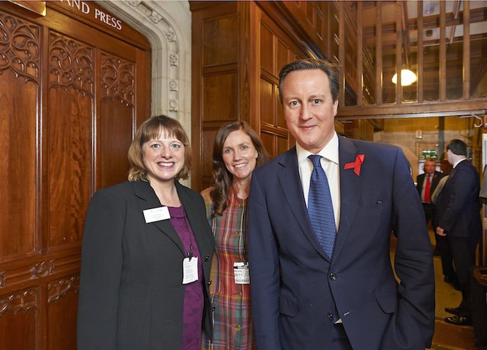 L-R Tracy Carroll of Local Food Surrey, Christine Howard of Visit Surrey welcome the Prime Minister to the Taste of Surrey event at the Houses of Parliament 26 November 2014[1].jpg